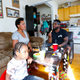 Eating, laughing, and watching TV.